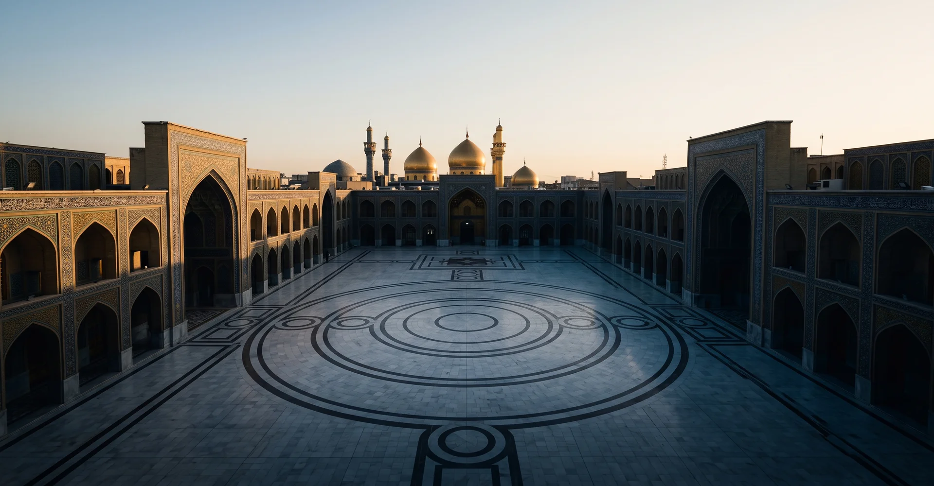 Aerial view at first light over a sanctuary courtyard with marble rings