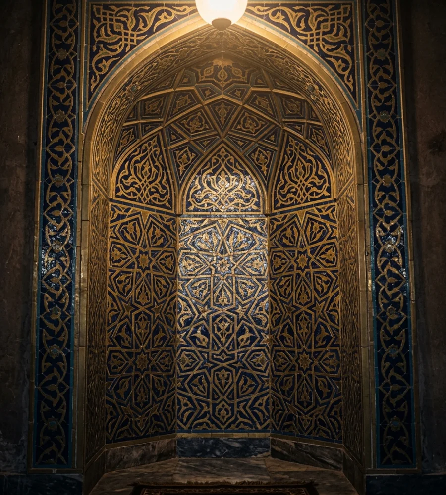 Tiled mihrab niche with blue and gold geometric patterning